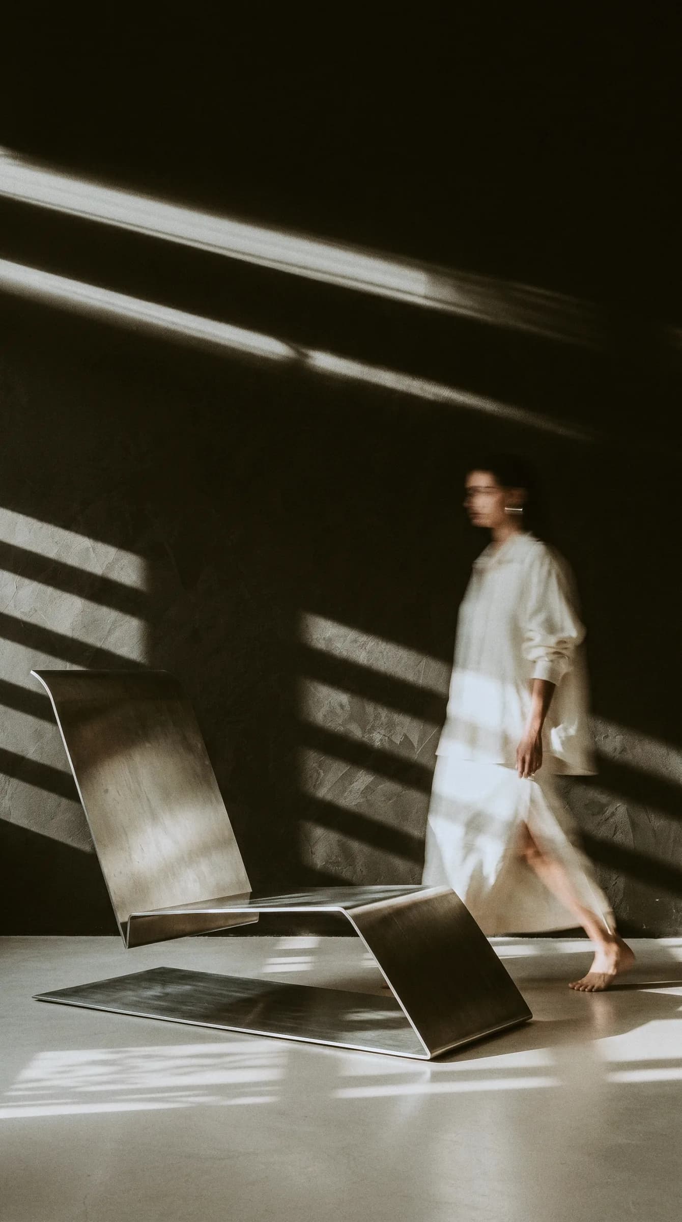 Steel Naked chair — studio dark portrait